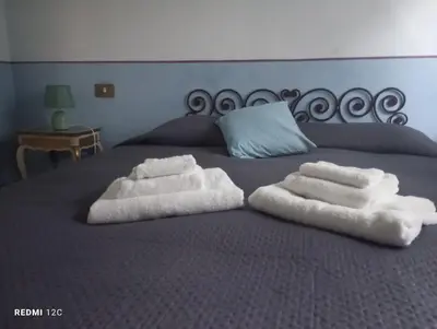 Letto o letti in una camera di Villa Maddalena - Cerrolungo