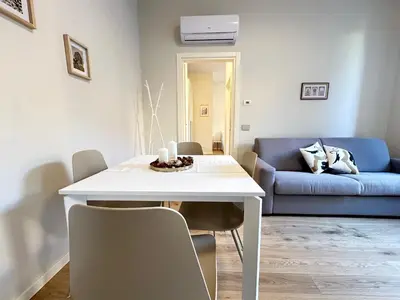 Area soggiorno di Bilocale Savoia parcheggio gratuito