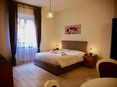 Letto o letti in una camera di Residenza Santachiara