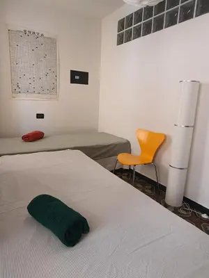 Letto o letti in una camera di Villa Paradiso