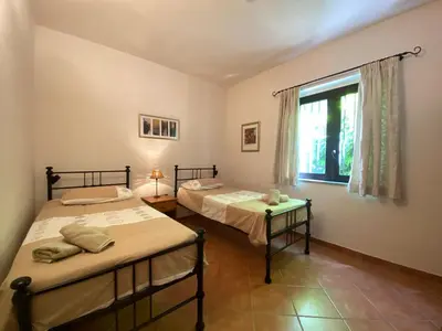 Letto o letti in una camera di Villa Il Nido 8 Pax by VILLASRETREATS