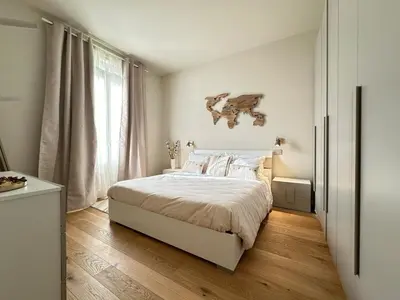 Letto o letti in una camera di Trilocale, 2 camere da letto, parcheggio gratuito