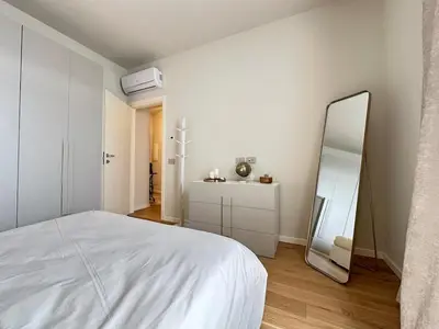Letto o letti in una camera di Trilocale, 2 camere da letto, parcheggio gratuito
