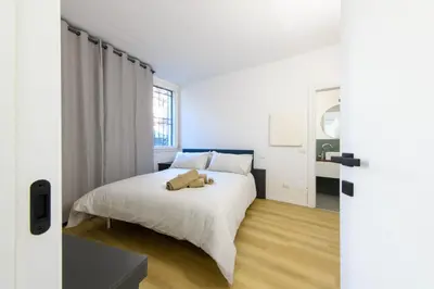 Letto o letti in una camera di il giardino di Alice