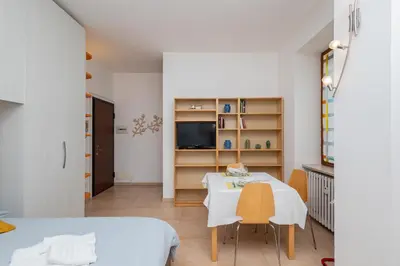 TV o dispositivi per l'intrattenimento presso La Casa sui Tetti - Appartamento vista Duomo di Pavia