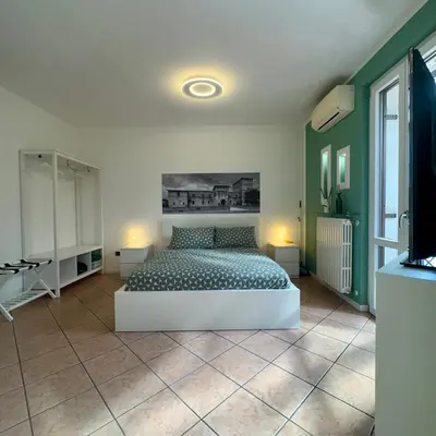 Letto o letti in una camera di Cas'Ale Suites Foresteria Lombarda