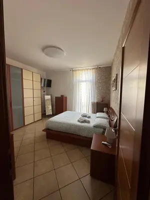 Letto o letti in una camera di Il Tortellino Quasi in Centro Elegant Apartment