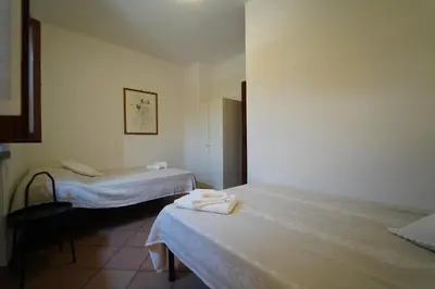 Letto o letti in una camera di Villa Adelaide 22 Pax by VILLASRETREATS