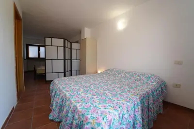 Letto o letti in una camera di Villa Adelaide 22 Pax by VILLASRETREATS