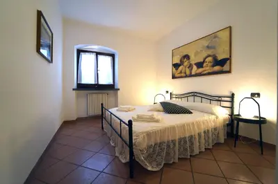 Letto o letti in una camera di Villa Adelaide 22 Pax by VILLASRETREATS