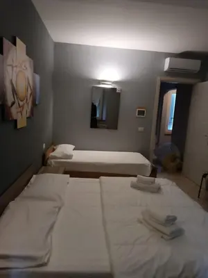 Letto o letti in una camera di Relax Time