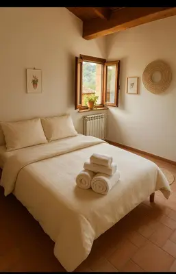 Letto o letti in una camera di Il suono del fiume
