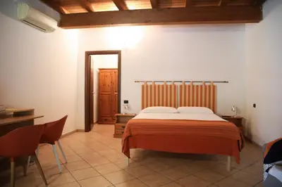 Letto o letti in una camera di Agriturismo Casari