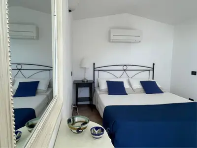 Letto o letti in una camera di Cottage con vista mozzafiato sul mare - Monterosso al mare