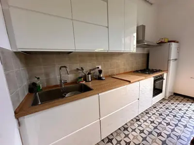 Cucina o angolo cottura di Bianca's garden 100 steps from the sea