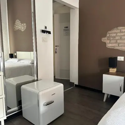 Letto o letti in una camera di Forum Guest House FREE Private Parking