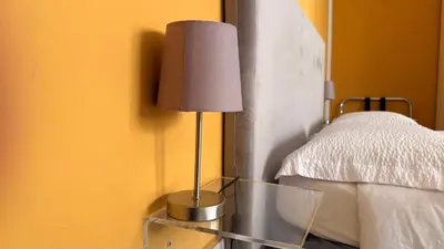 Letto o letti in una camera di Forum Guest House FREE Private Parking