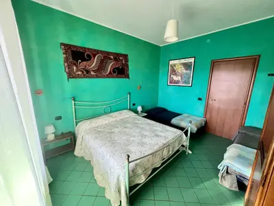 Letto o letti in una camera di La Casa Rosa