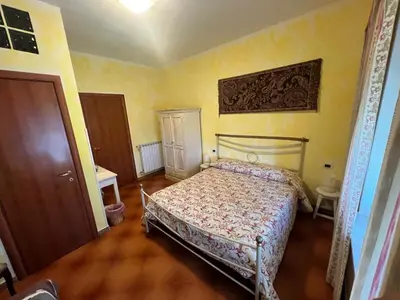 Letto o letti in una camera di La Casa Rosa