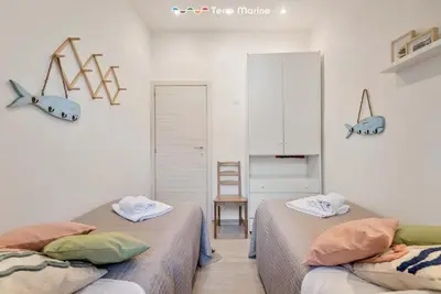 Letto o letti in una camera di L'Antica Piazzetta, Terre Marine