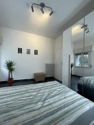 Letto o letti in una camera di Appartamento Calma