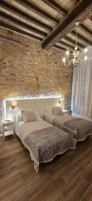 Letto o letti in una camera di Le camere di Rigoletto B&B