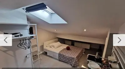 Letto o letti in una camera di Mansarda 2 SB