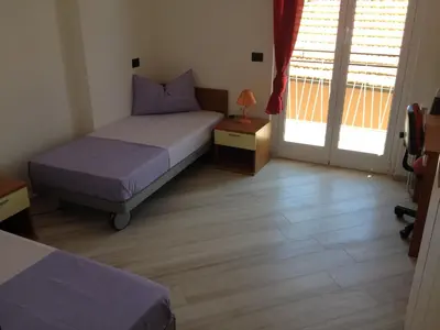 Letto o letti in una camera di Best Lavagna Apartment