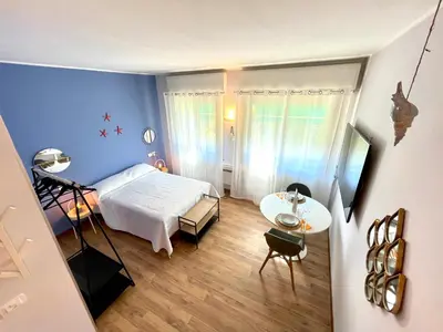 Letto o letti in una camera di JOIVY Ferraretto cosy studio for 2 in Rapallo