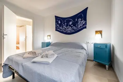 Letto o letti in una camera di GuestHost - Oltre il Mare - Peaceful Retreat in Liguria