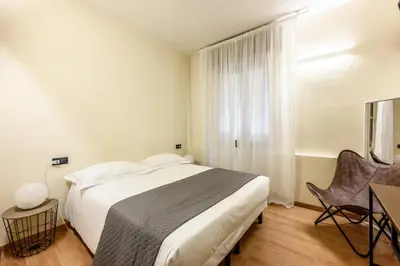 Letto o letti in una camera di Emilia Studios 2