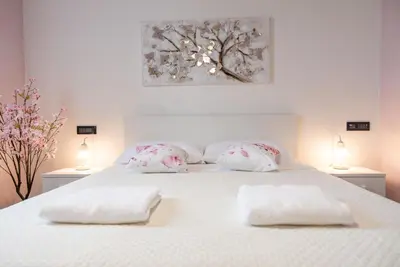 Letto o letti in una camera di Villa Sun Kiss