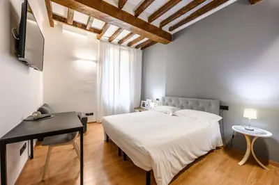 Letto o letti in una camera di Emilia Studios 3
