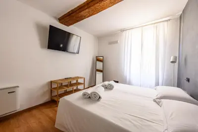 Letto o letti in una camera di Emilia Studios 5