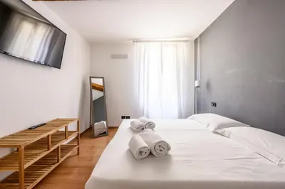 Letto o letti in una camera di Emilia Studios 8