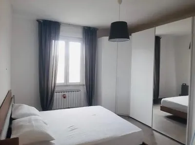 Letto o letti in una camera di Welcome Migliarina 3