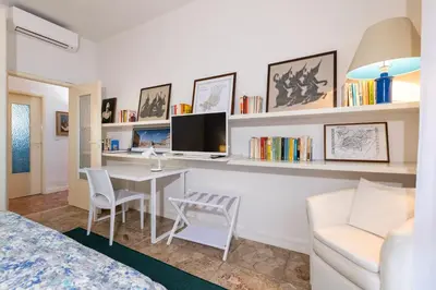 TV o dispositivi per l'intrattenimento presso Suite Bellini - Affitti Brevi Italia