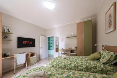 Letto o letti in una camera di Italian Experience- Lory House