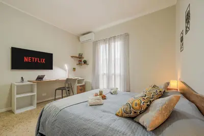 Letto o letti in una camera di Italian Experience- Lory House