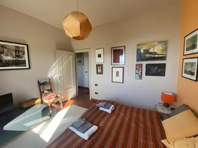 Letto o letti in una camera di Una casa nel verde sulle colline di Lavagna