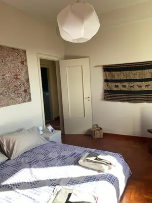 Letto o letti in una camera di Una casa nel verde sulle colline di Lavagna