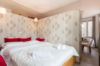 Letto o letti in una camera di Among the roofs of Parma!