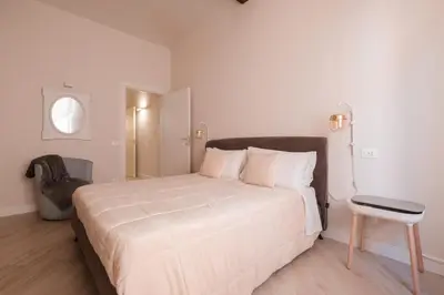 Letto o letti in una camera di Molinari House Perla - Suite moderna in centro Modena - Free ZTL