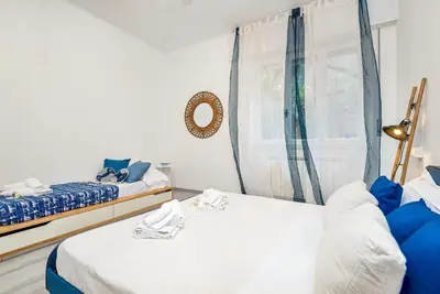 Letto o letti in una camera di Cosy Corner Apartment with Terrace