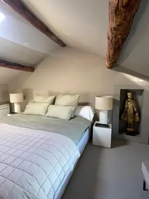Letto o letti in una camera di Villa Eleonora Italia
