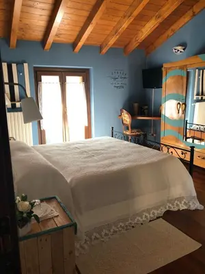 Letto o letti in una camera di B&B Amici del Colle