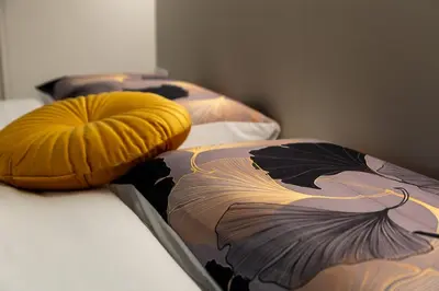 Letto o letti in una camera di Salotto Corso Garibaldi