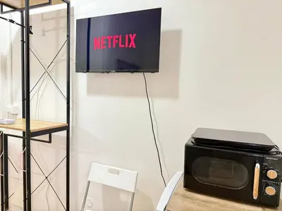 TV o dispositivi per l'intrattenimento presso Netflix - Vicino al Centro - Via Rometta Suite