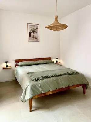 Letto o letti in una camera di Via Alla Spiaggia