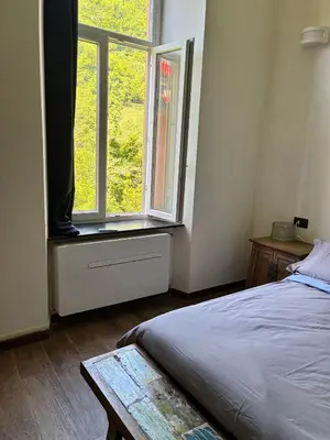 Letto o letti in una camera di C'era un Voltino Guest House